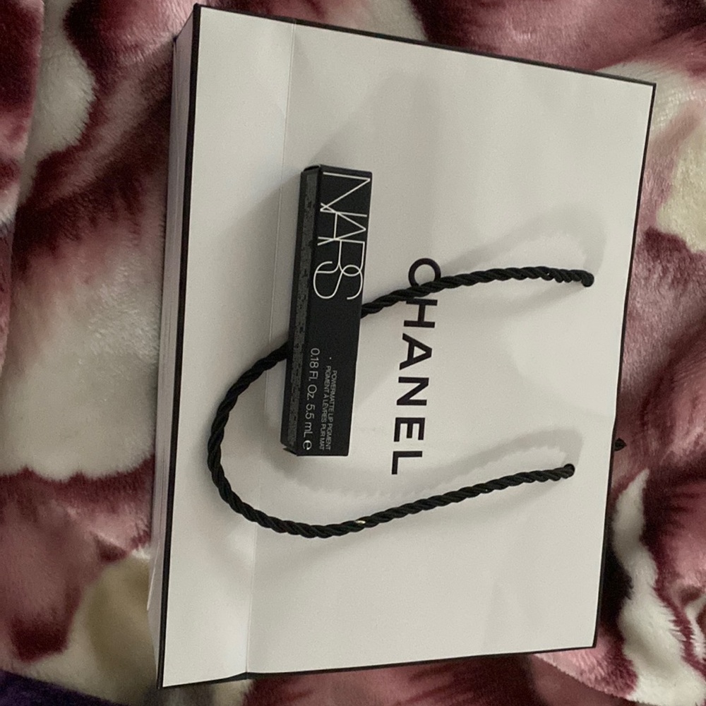 Chanel box, and NARS lip power pigment.